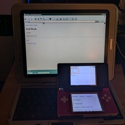 A compaq TC1000 and nintendo DSi, both displaying a page titled "Jrnl Dash" in their respective web browsers.